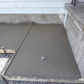 Photos by Reaper Junk Removal Services #6 New sidewalk with removal of old sidewalk.