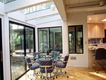 1990: Expansive Entertainment Kitchen This Mount Helix home was a perfect setting for a green house addition facing the view. Why? Greenhouse additions