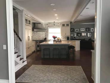 Oakland County General Remodel This Oakland County general remodel is the best kind of neutral. Tall coffered ceilings and large arched windows that br