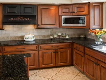 Kitchen Cabinet Refacing View our project portfolio to see our high-quality kitchen cabinet refacing restorations.