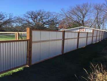 Corrugated steel privacy fencing