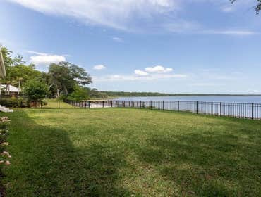 Bells River Residence Nestled in the serene Waterman’s Bluff in Yulee, FL, this exquisite home offers 3,046 sq ft of living space, expanding to a total