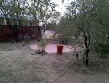 Thompson Pro Landscaping Project Simple clean up in Benson A.Z. It started as a one or two day clean up.From there stucco patch's on the house and demo
