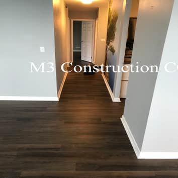 Photos by M3 Construction Co #1 1200 sq ft luxury vinyl plank on lake front high-rise
