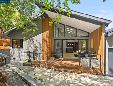 Photos by Us Accurate Construction #9 Addition of 1400 sq. ft to the existing house, New built 2 cars garage, existing renovation, New retaining wall a