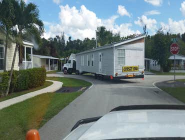 Photos by Blanchard's Mobile Home Removals and Transport Inc #1 New Clayton 16' X 76' Single wide Manufactured Home Spread Base Pad For Home, position 