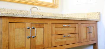 Spalinger Vanity The clients requested a custom vanity for their bathroom remodel, which would not accommodate a standard vanity. They wanted a furnitu