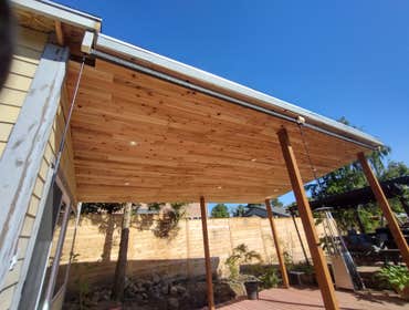Photos by Stewart & Son Gate & Fence LLC #1 Tiny House with pergola. Small house 17' by 12' small bathroom with pocket door, and small sink with water 