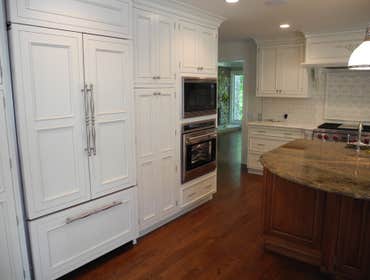 Kitchen Remodel; Central NJ A very large, High End Kitchen with mixed Cherry and White Cabinets. Granite center island and white Marble perimeter coun