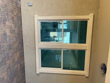 Photos by Gordon Enterprises Contracting LLC #9 Remove windo and install a entry door open wall and install door decide home to make a separate living 