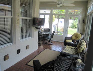 Tampa Lanai Enclosure This fully insulated glass enclosure allows the space to be used year round.