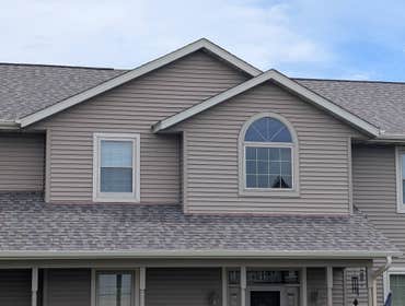New Glarus roof replacement in Weathered Wood - June 2025 Complete roof and gutter replacement for this New Glarus home. We used CertainTeed Weathered 