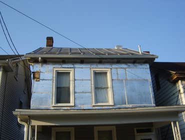 Swank Home Makeover A 2.5 story, single-family home: Siding, windows, insullation, soffit, fascia, capping. Also, repaired fence damage, installed new
