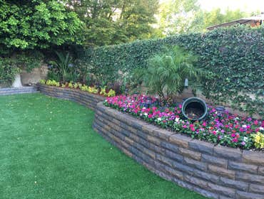 Backyard turf retaining wall planter - Canoga Park