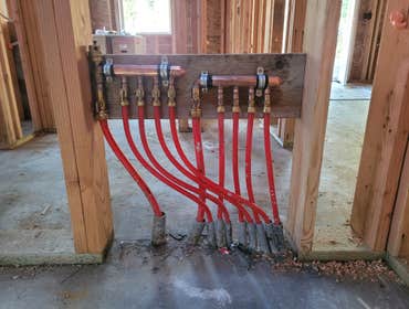 Photos by Top of the West Plumbing #2 5 bathroom, 2 kitchen, 2 laundry rooms. Hydronic floor heating throughout.