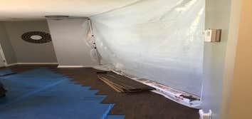 Mold Removal Washer had been leaking without homeowners knowledge until they noticed the floors warping.