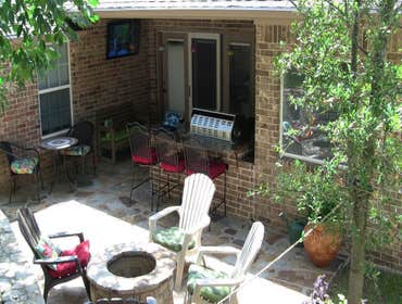 Cedar Garage Door and Backyard Kitchen