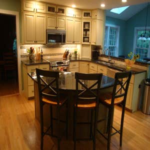 Kitchen Remodel This kitchen was updated with additional custom made cabinets to compliment the existing cabinets while increasing storage,...