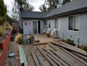 Back yard remodel, build Pergola, custom exterior dining table, sliding screen door and fire pit/outdoor leisure area. From backyard disaster to custom