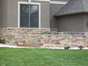 New stone exterior and patio