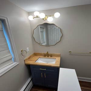 Bathroom Remodel With Cabinets and Paint Outside