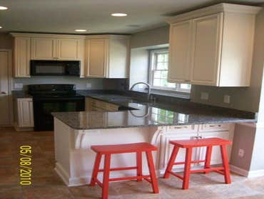 TRIANGLE HOME SOLUTIONS kitchen renovation This beautiful kitchen renovation in Cary, NC included cabinet installation, granite counter tops, vinyl flo