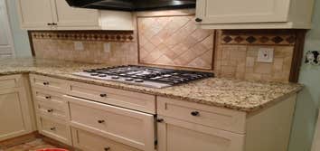 cabinets/granite/backsplash
