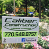 Caliber Construction logo