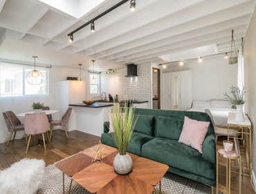 Open Concept ADU We aimed to build an ADU ideal for residents and guests, despite its compact size. Our design creates a spacious atmosphere while maxi