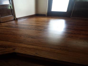 PREMIER HARDWOOD RESTORATIONS vs. PET STAINS Red oak hardwood damaged by pets stains. Job to be sand and finished with a dark walnut stain to hide/camo