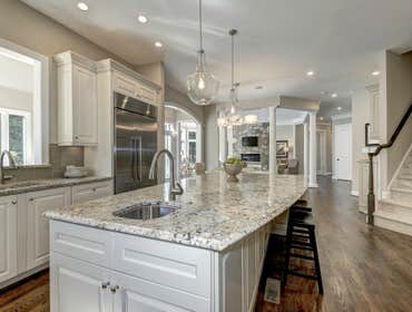 GULICK | CUSTOM Home in McLean The impressive stone and HardiePlank® elevation on our Winthrop really stood out on this corner lot of approximately one