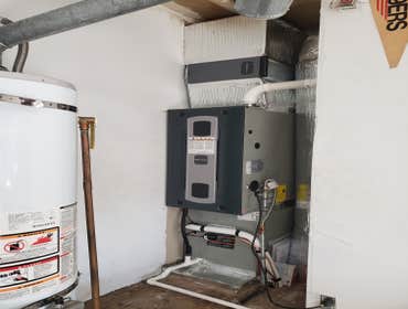 Photos by Castle Heating & Air #5 Furnace replacement and A/C add on.