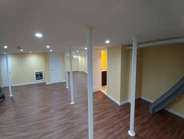 Photos by Pascal's Handyman Services, Design by Pal #12 Finished basement, with utility room, wine cellar and bathroom.