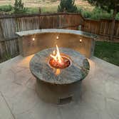 Bateman Patio Remove old patio and build a new patio with Intergrated fire pit and lighting.