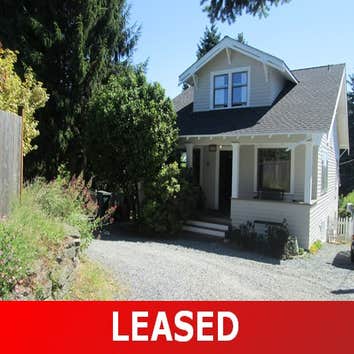 Single Family Home in Seattle Tucked back (From Holman Road, turn Right onto 12th and then Right on to the 9500 Block) is a spacious, charming rambler
