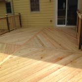 RESIDENTIAL EXTERIOR PROJECT Siding replacement and custom deck project.