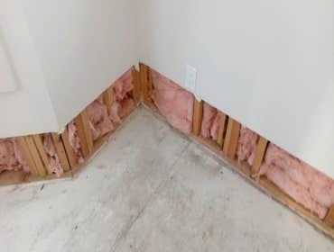 Photos by Show Quality LLC #10 Flood damage, due to Ice maker supply line from refrigerator rupture. We repaired walls, matched the wall texture, repl