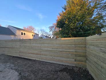 Photos by Rojas Landscaping & Handyman Services LLC #1 Preasure Threated Wood Horizontal Fence Installation
Exterior Fire Place
Paavers Patio/walkway