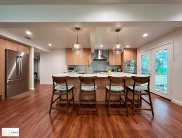 Addition & Open Concept Kitchen Remodeling Addition to a 2 story house with full first floor remodeling that include open concept kitchen removal of lo