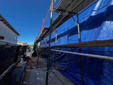Photos by Santiago's Bay Builders Inc #1 Remodeling half of the building