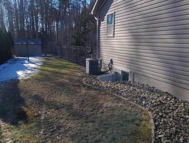 Photos by Steve Danylko Land Service #1 New lawn and landscaping