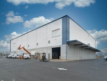 320 Paterson Plank Two-story warehouse constructed from the ground up after demolition of previous buildings.