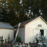 You All's Country Gifts - Tipton County Replace roof on home and Replace red roof on one shop.