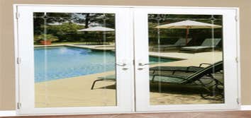 Window Replacement specialist The patio door picture was previously a window we cut down and created a patio door.
