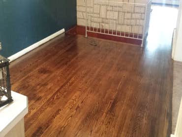 PREMIER HARDWOOD RESTORATIONS vs. PET STAINS Red oak hardwood damaged by pets stains. Job to be sand and finished with a dark walnut stain to hide/camo