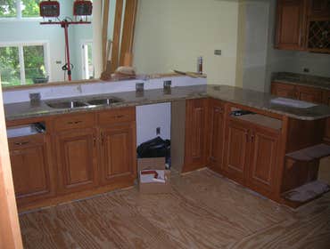 Kitchen Redesign from Inner Circle Concepts This simple kitchen renovation was designed to revamp its original showcased feel with new cabinets and gra