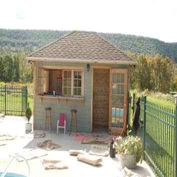 Custom Poolside Cabana This is a custom poolside cabana we designed and built for a local family. Amenities include an outdoor shower, wet bar, changi