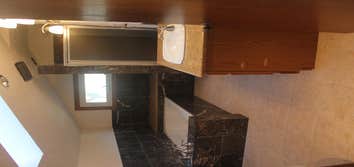 House Rennovation This is one of our flipped houses turned rental properties. We revamped the kitchen, bathrooms, carpeted the floors, refinished the w