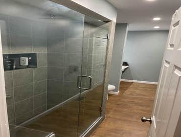 Photos by Pride Home Builders LLC #1 Complete bathroom remodel after discovering leak from incorrectly installed shower.
This bathroom meets the newes