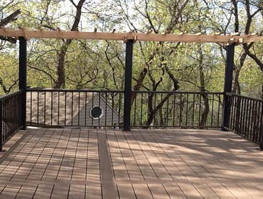 Photos by Custom Home Specialties Inc #2 Timber Tech maintenance free decks with powder coated railings.